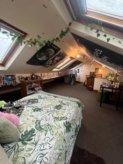 Property photo 1 of 28 Bright And Spacious Living Area Featuring Large Wi...