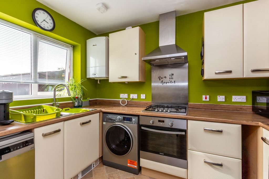 Property photo 2 of 12 Kitchen