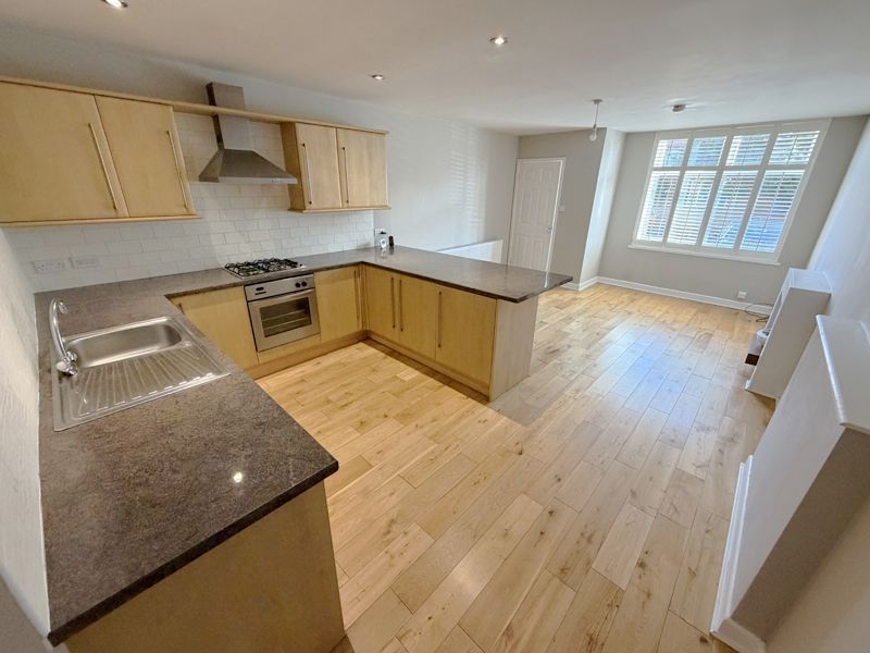 Property photo 2 of 18 Lounge Through Kitchen