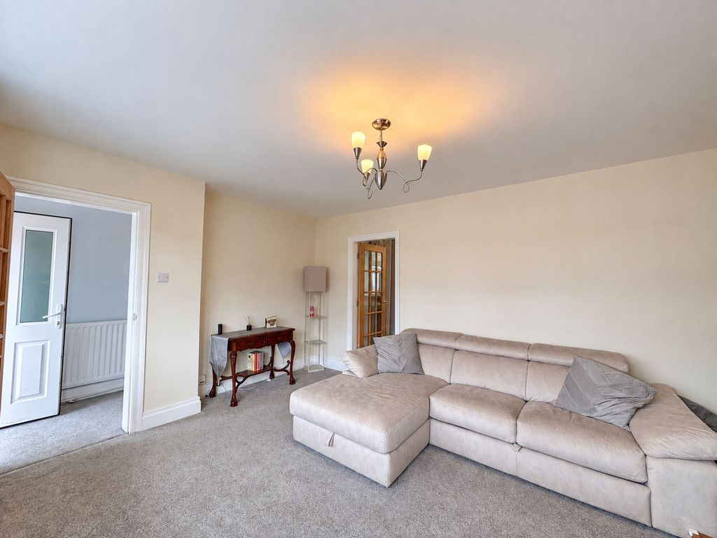 Property photo 3 of 15 Living Rooms
