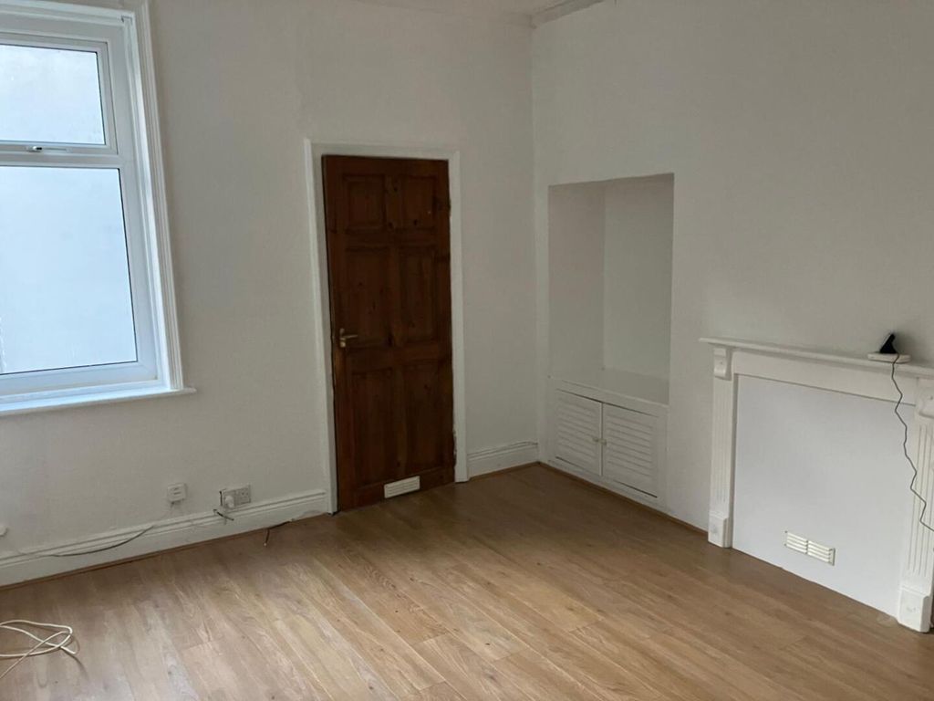 Property photo 2 of 8 Living Room