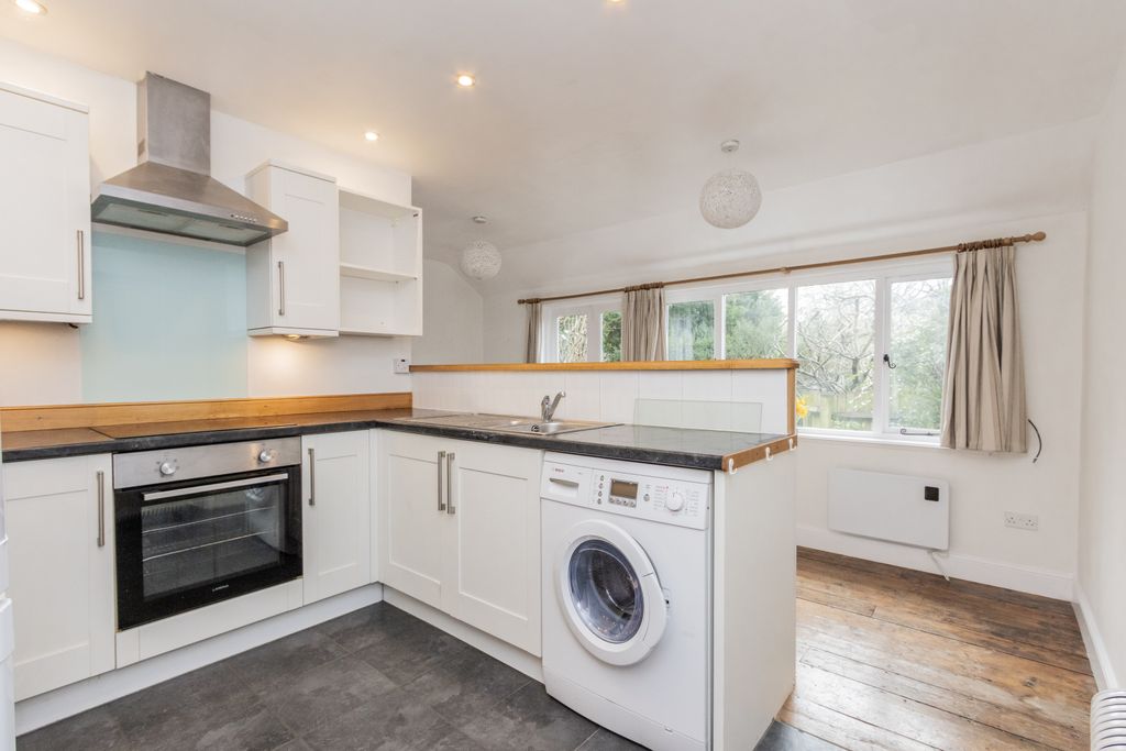 Property photo 2 of 7 Kitchen Side