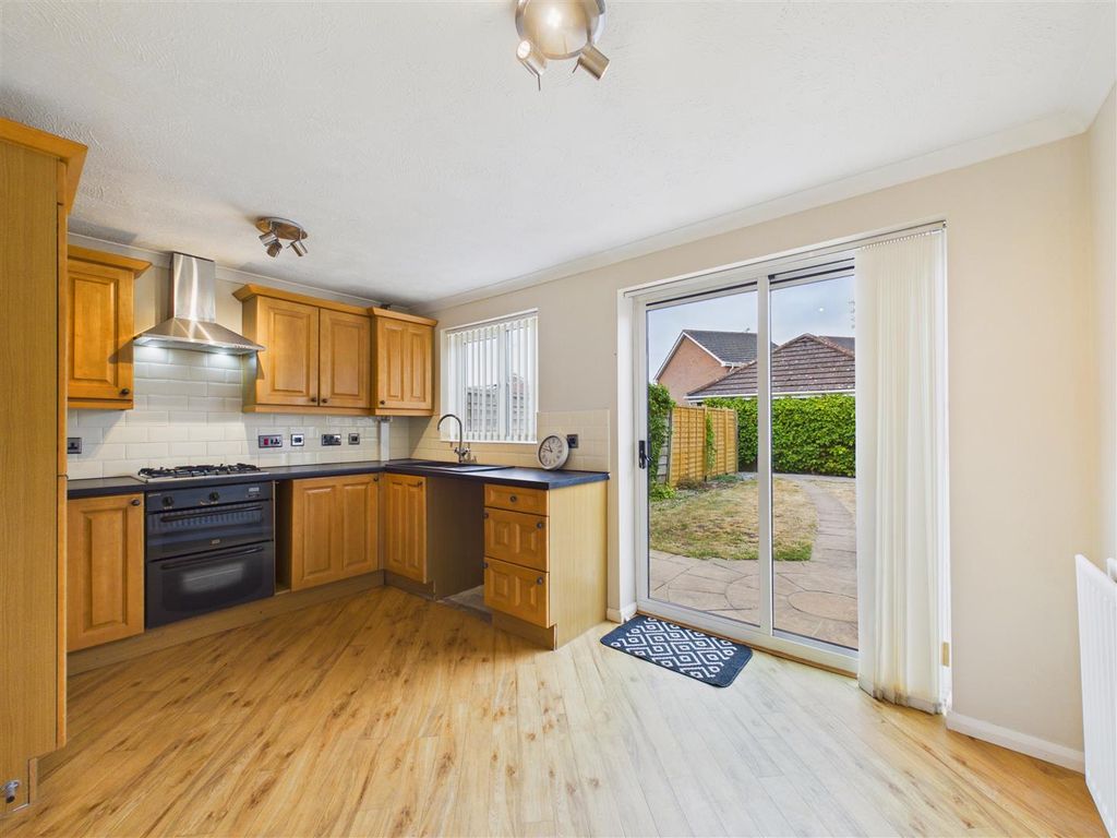 Property photo 3 of 13 Dining Kitchen