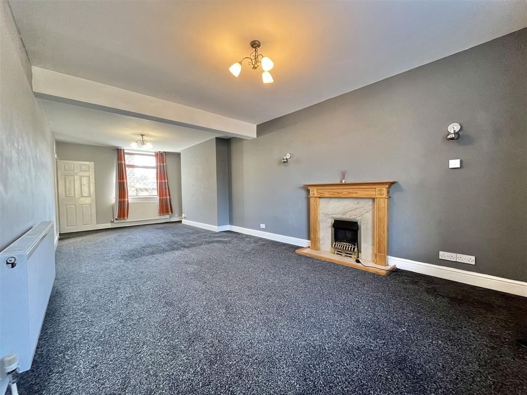 Property photo 3 of 12 Through Living Room