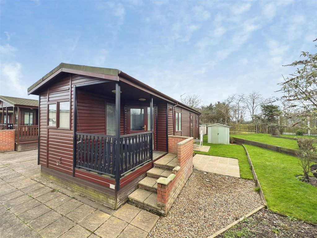 Property photo 1 of 8 ee7E669c-Front.Jpg