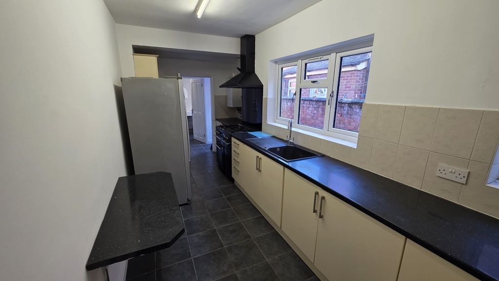 Property photo 2 of 13 Kitchen