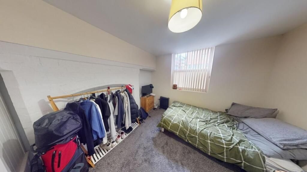 Property photo 1 of 14 Bright And Cozy Master Bedroom Featuring A Comfort...