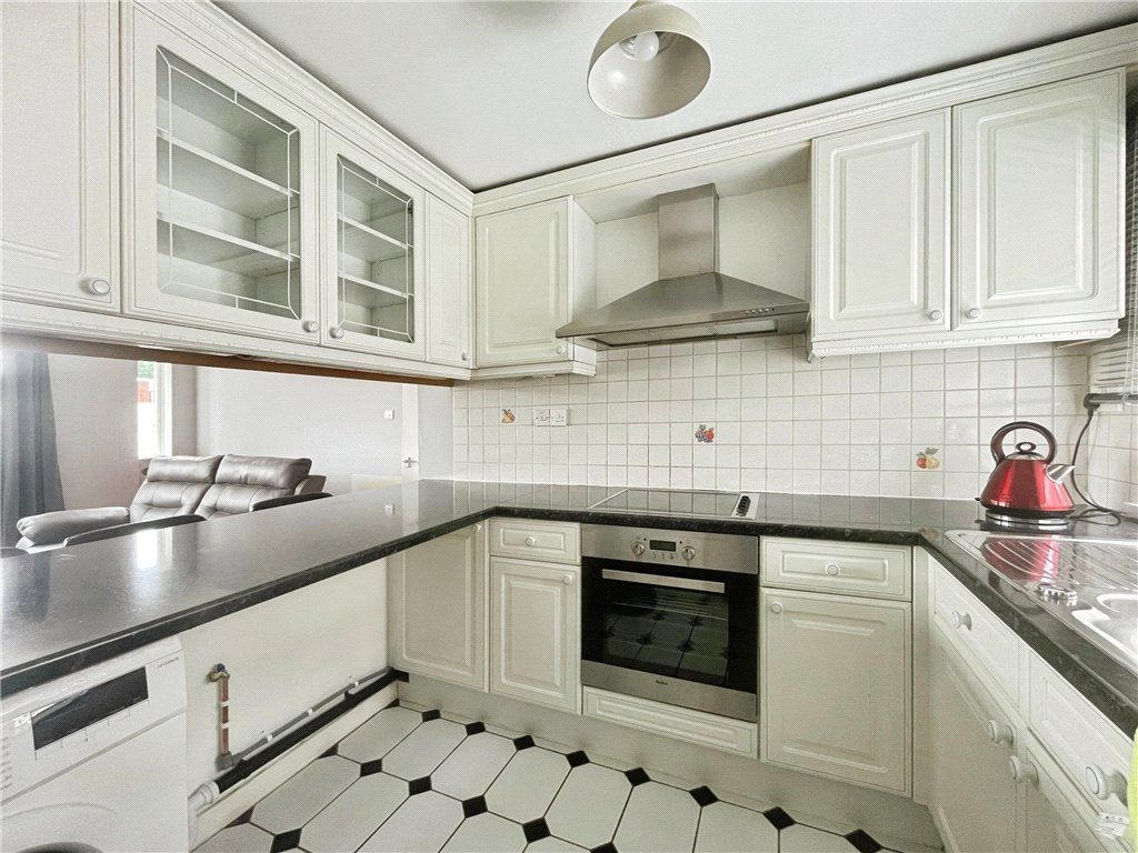 Property photo 3 of 12 Kitchen