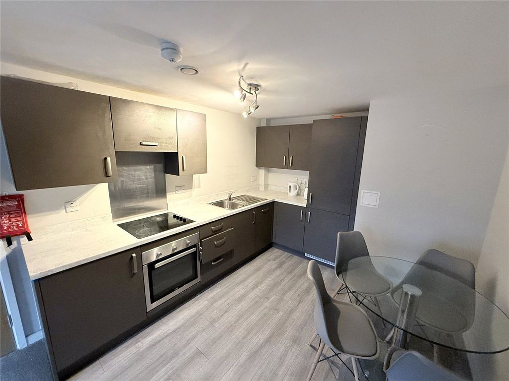 Property photo 3 of 12 Kitchen