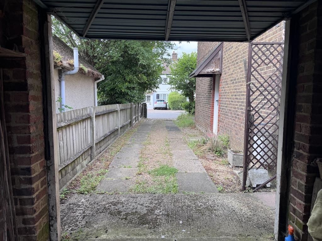 Property photo 2 of 15 2 - Garage & Drive.Jpg