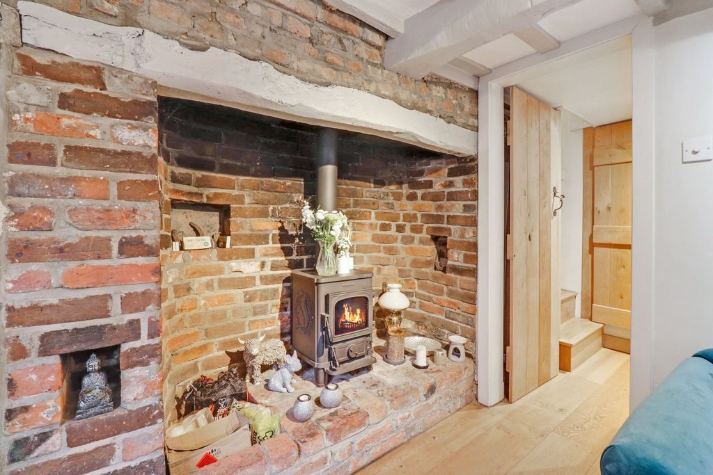 Property photo 3 of 12 Fireplace