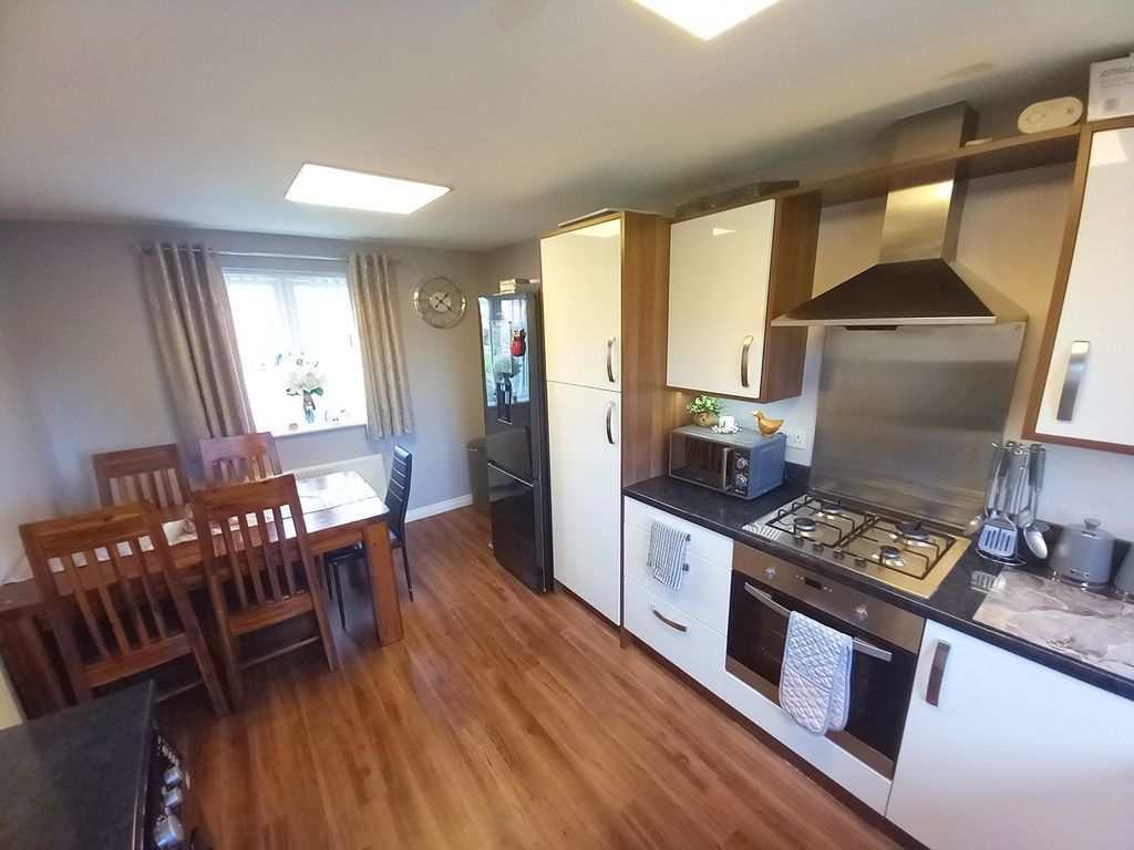 Property photo 3 of 13 Dining Kitchen