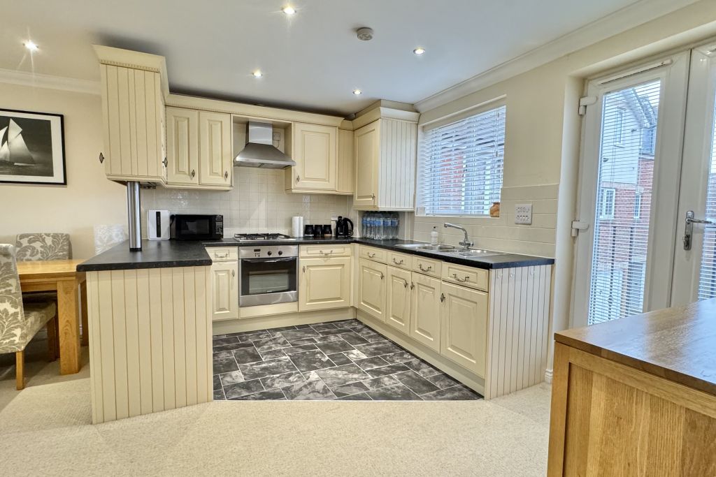 Property photo 1 of 13 Kitchen Area