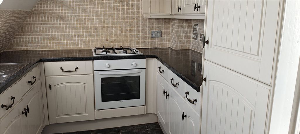 Property photo 3 of 8 Kitchen