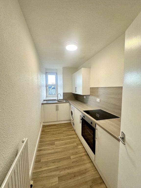 Property photo 1 of 7 Kitchen