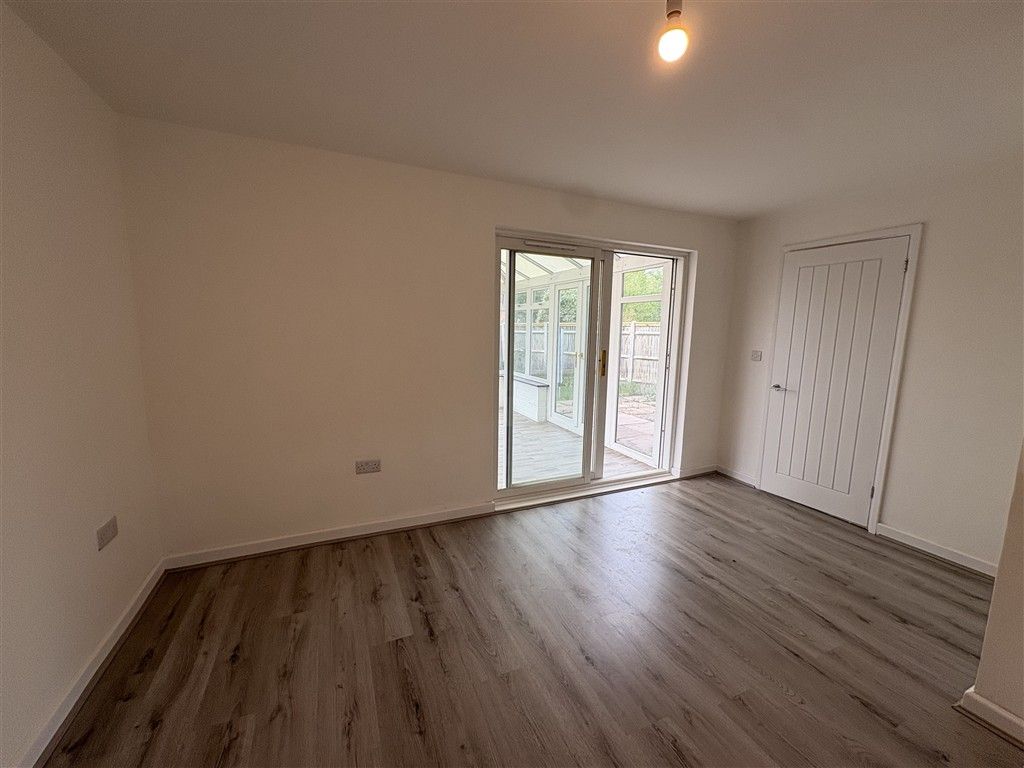 Property photo 3 of 13 .