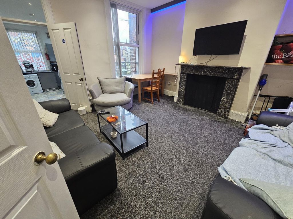 Property photo 1 of 22 A Modern, Well-Lit Living Room Featuring A Large S...