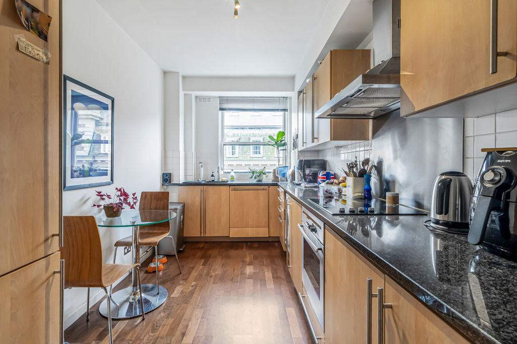 Property photo 3 of 9 Kitchen