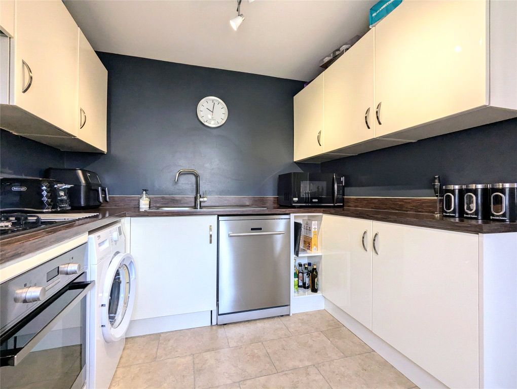 Property photo 3 of 12 Kitchen