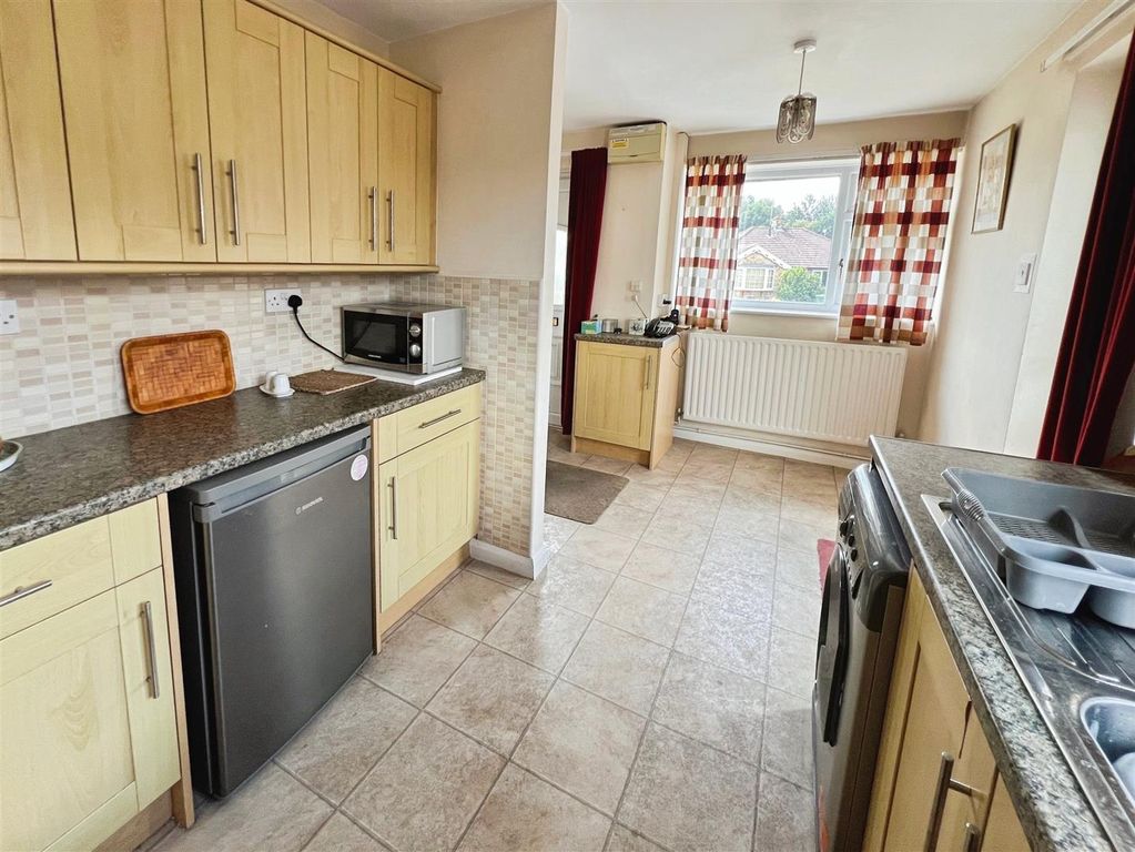 Property photo 3 of 13 Dining Kitchen