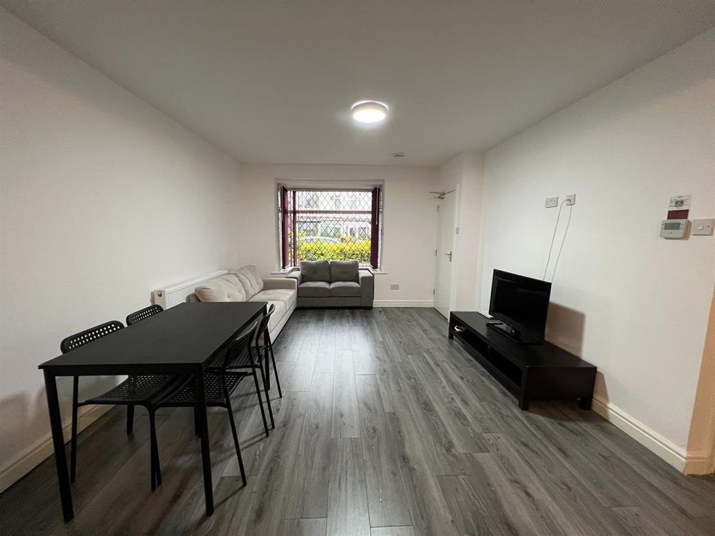 Property photo 1 of 11 Bright, Modern Living Room With Sleek Grey Wood Fl...