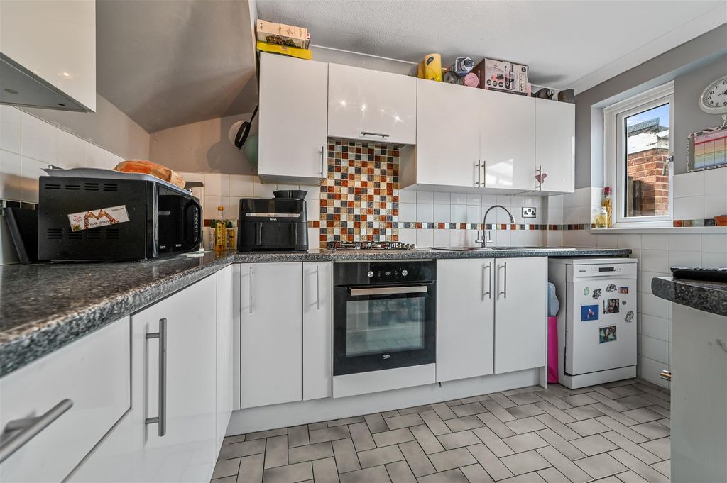 Property photo 3 of 13 Kitchen