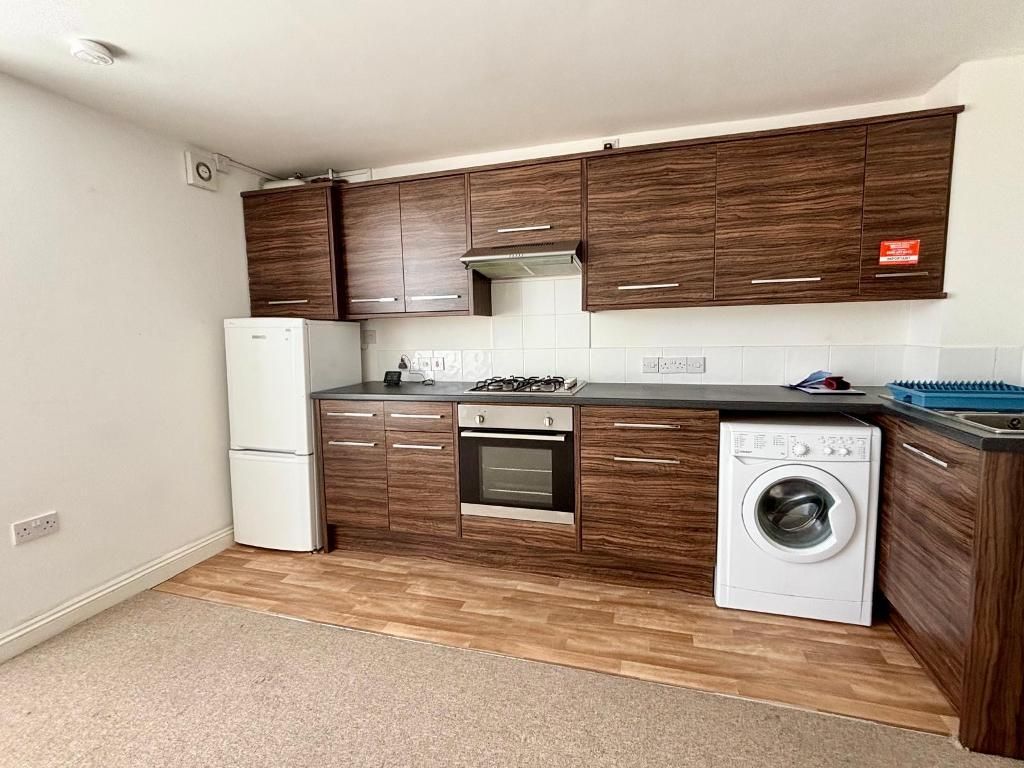 Property photo 3 of 6 Kitchen Area