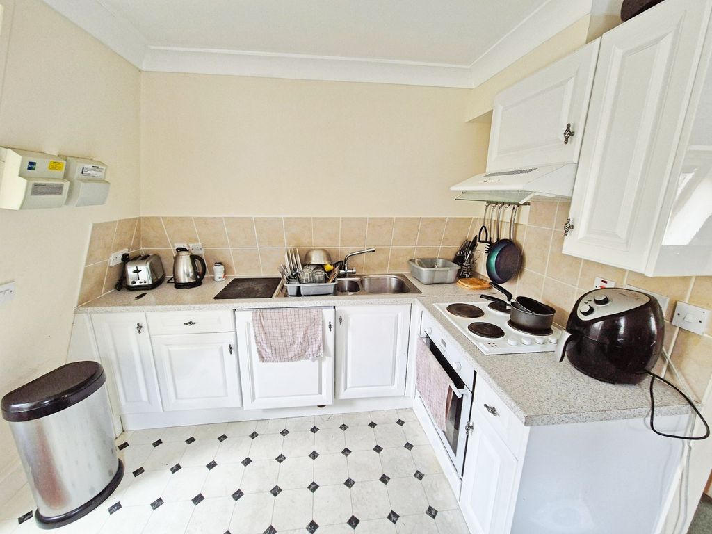 Property photo 2 of 6 Kitchen Area