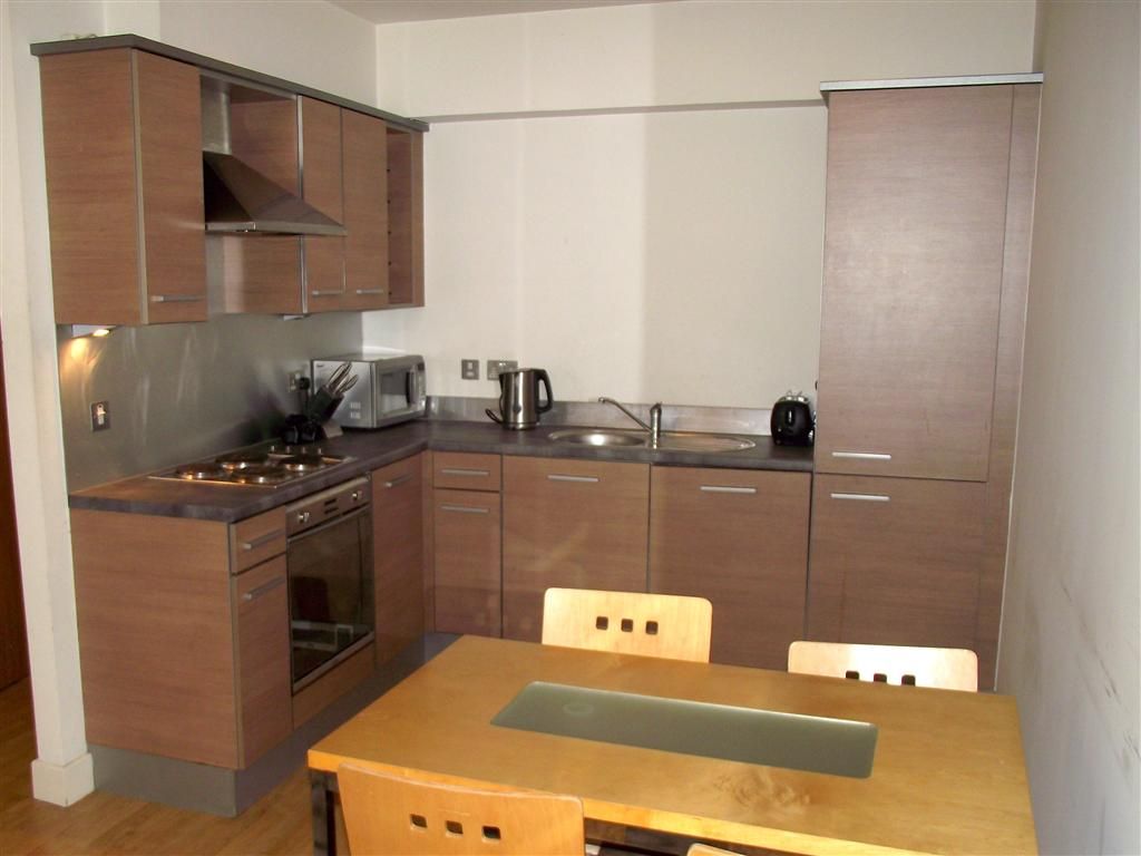 Property photo 3 of 8 Kitchen