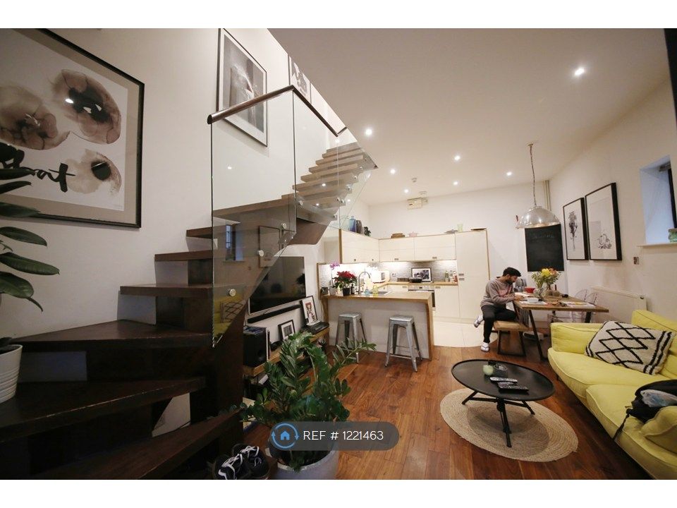 Property photo 1 of 13 Living Area With Floating Staircase