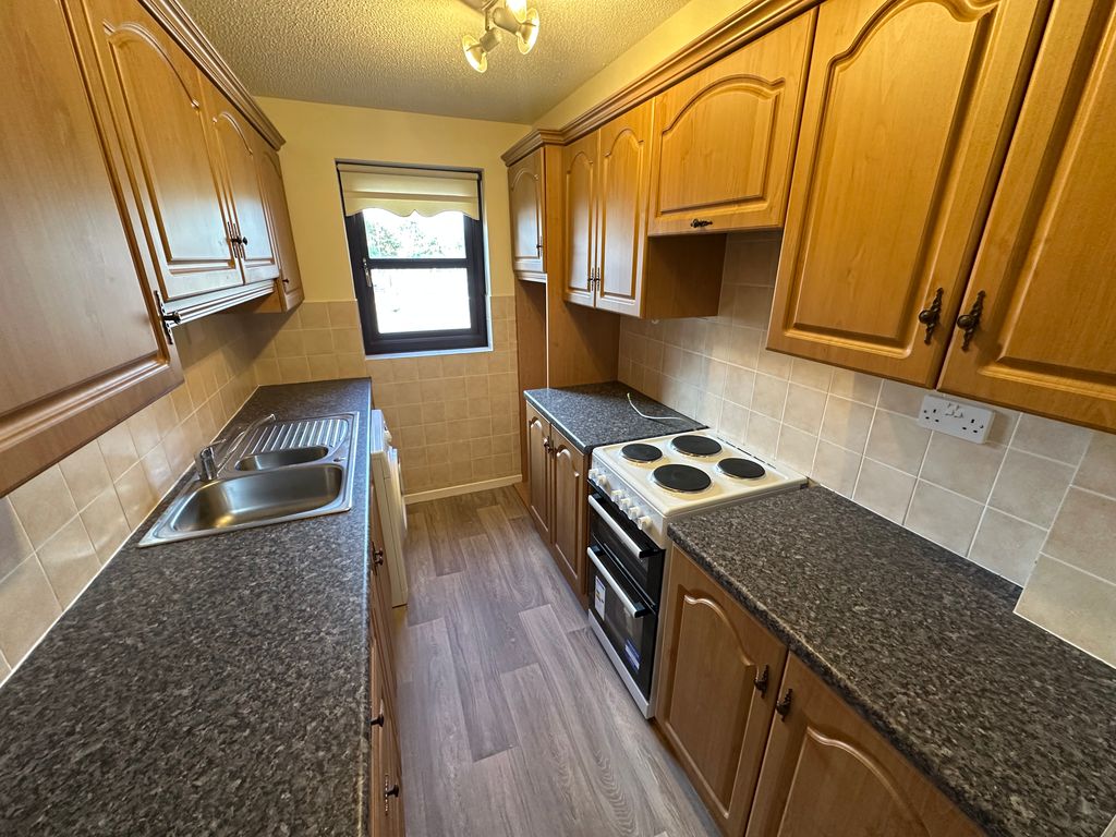 Property photo 3 of 6 Kitchen
