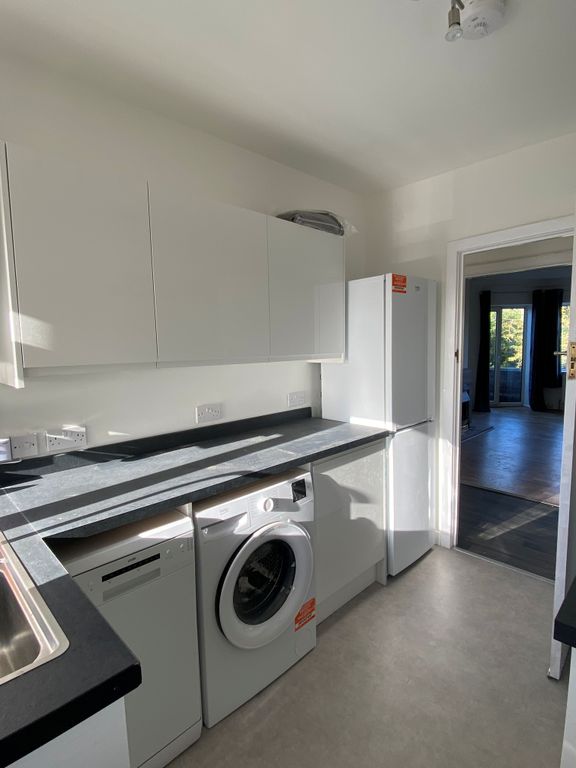 Property photo 3 of 7 Kitchen