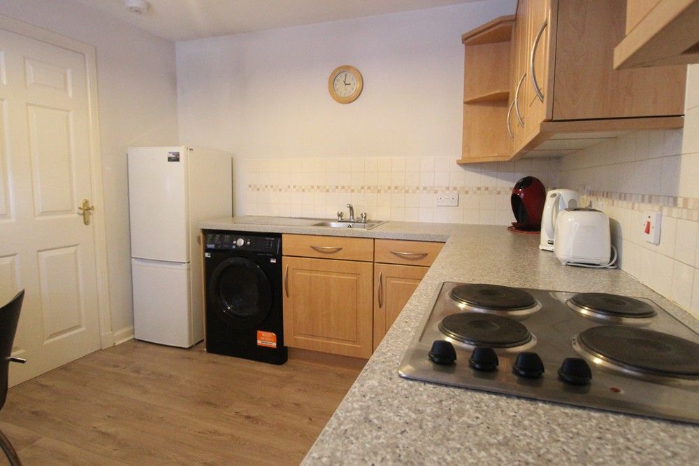 Property photo 2 of 8 Kitchen
