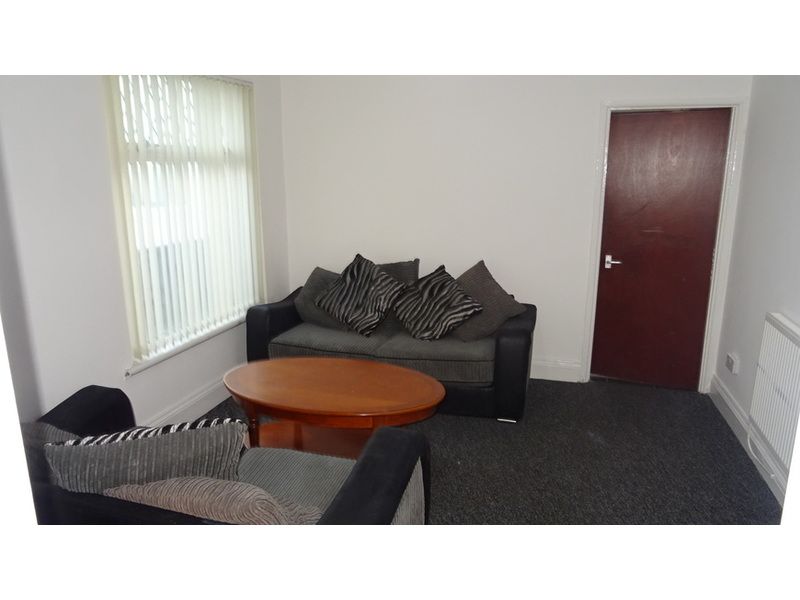 Property photo 3 of 12 Living Room