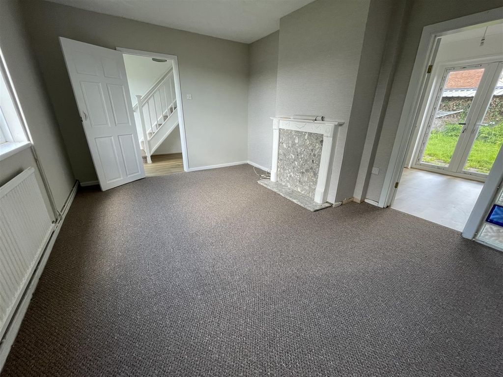 Property photo 3 of 24 Front Living Room