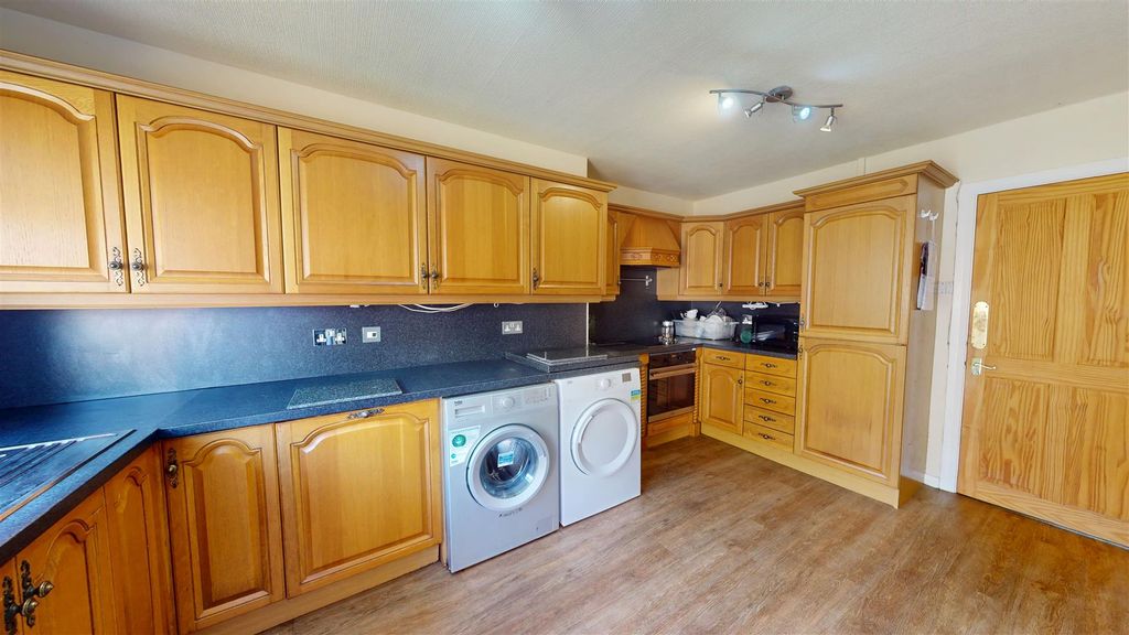 Property photo 2 of 14 Dining Kitchen