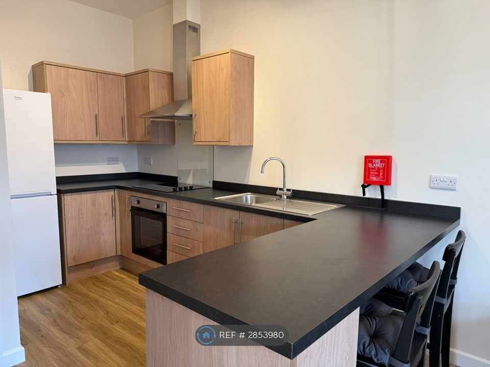 Property photo 3 of 8 Kitchen