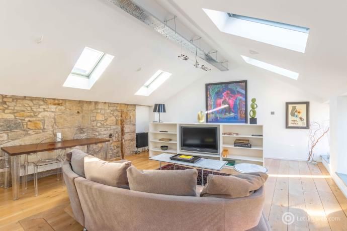 Property photo 2 of 13 Living Room/Kitchen Area