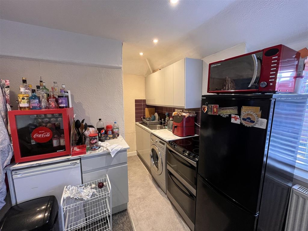 Property photo 3 of 6 Kitchen Area