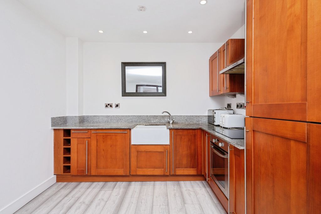 Property photo 3 of 11 Kitchen