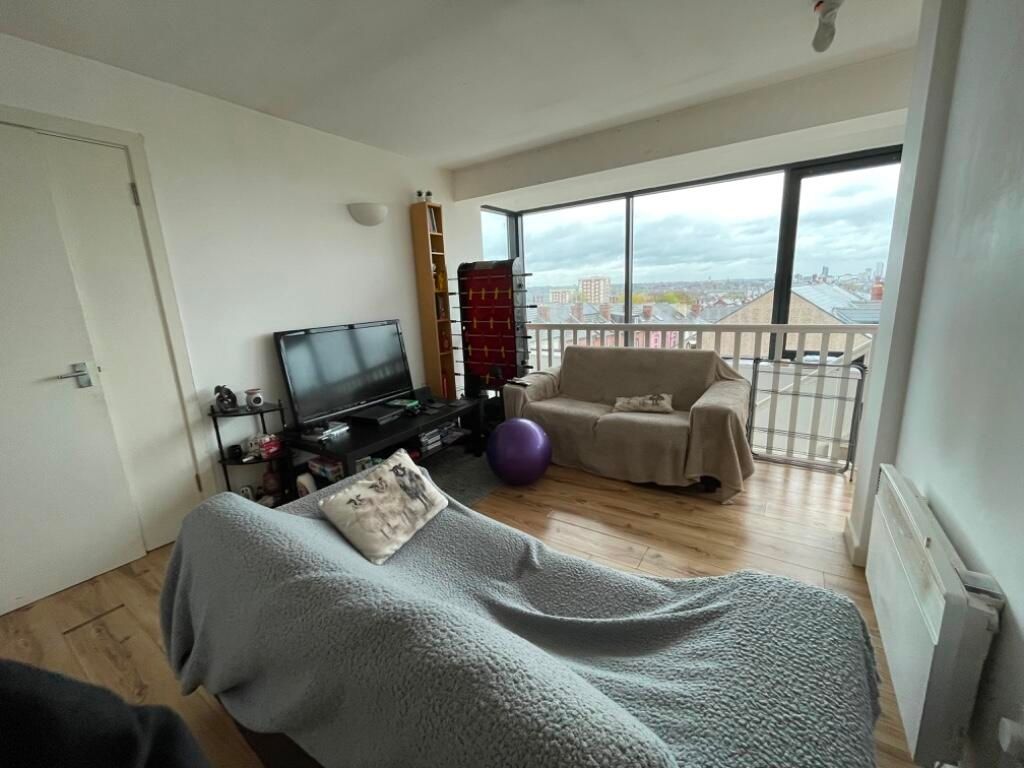 Property photo 1 of 3 Bright Living Room With Large Floor-To-Ceiling Win...