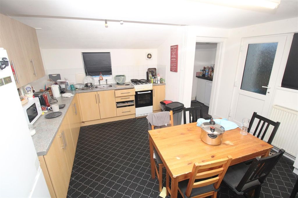 Property photo 1 of 5 Spacious Kitchen With A Bright Dining Area...