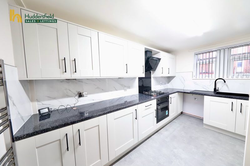 Property photo 3 of 9 Kitchen