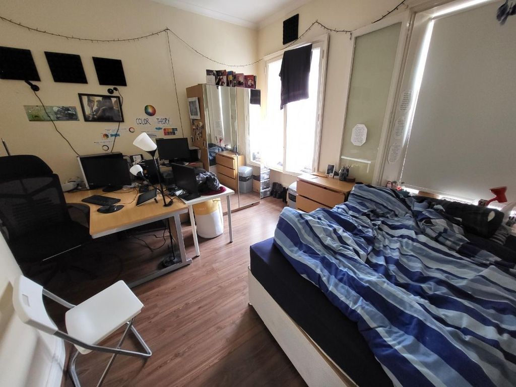 Property photo 2 of 3 A Cozy Double Bedroom Featuring Ample Natural Ligh...