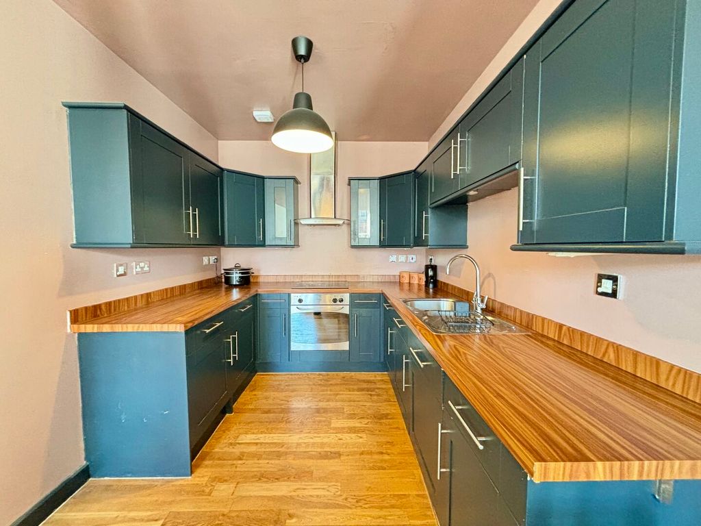 Property photo 2 of 12 Kitchen