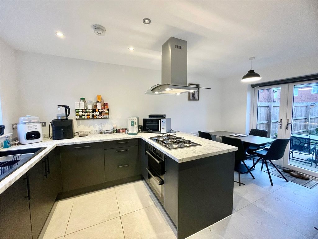 Property photo 2 of 16 Dining Kitchen