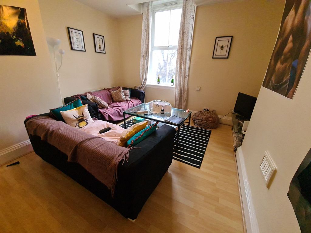 Property photo 3 of 11 Bright, Comfortable Living Room With A Large L-Sha...