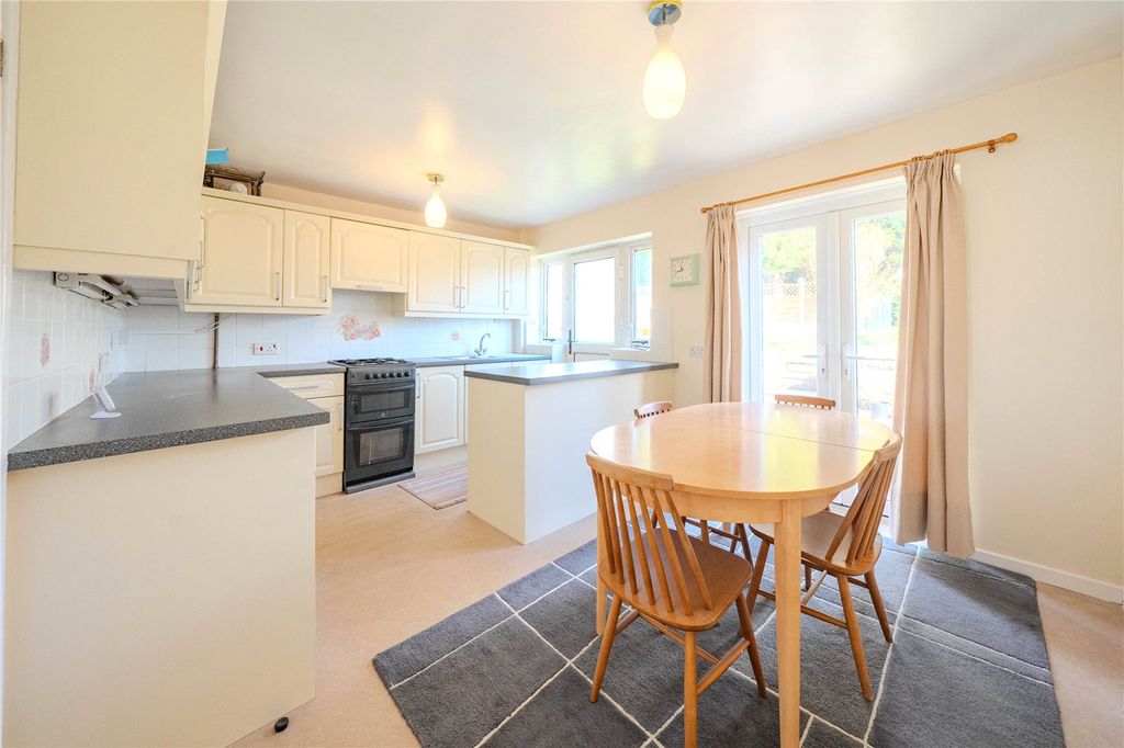 Property photo 3 of 13 Dining Kitchen