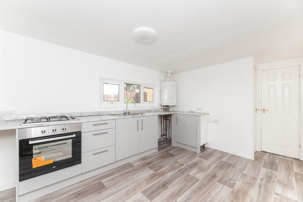 Property photo 2 of 18 Dining Kitchen
