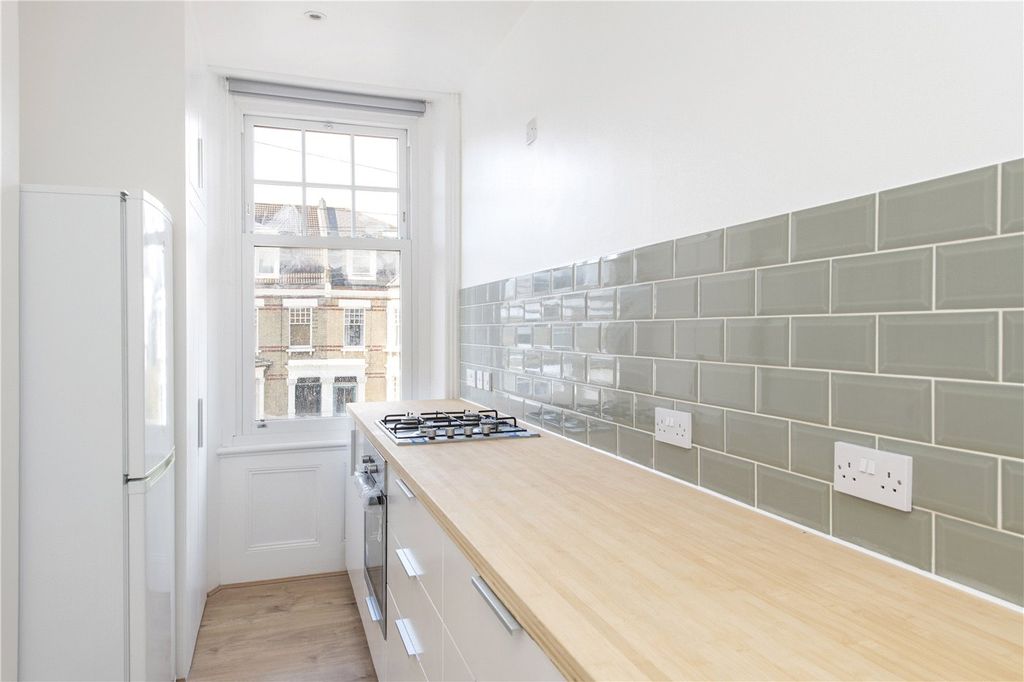 Property photo 3 of 8 Kitchen